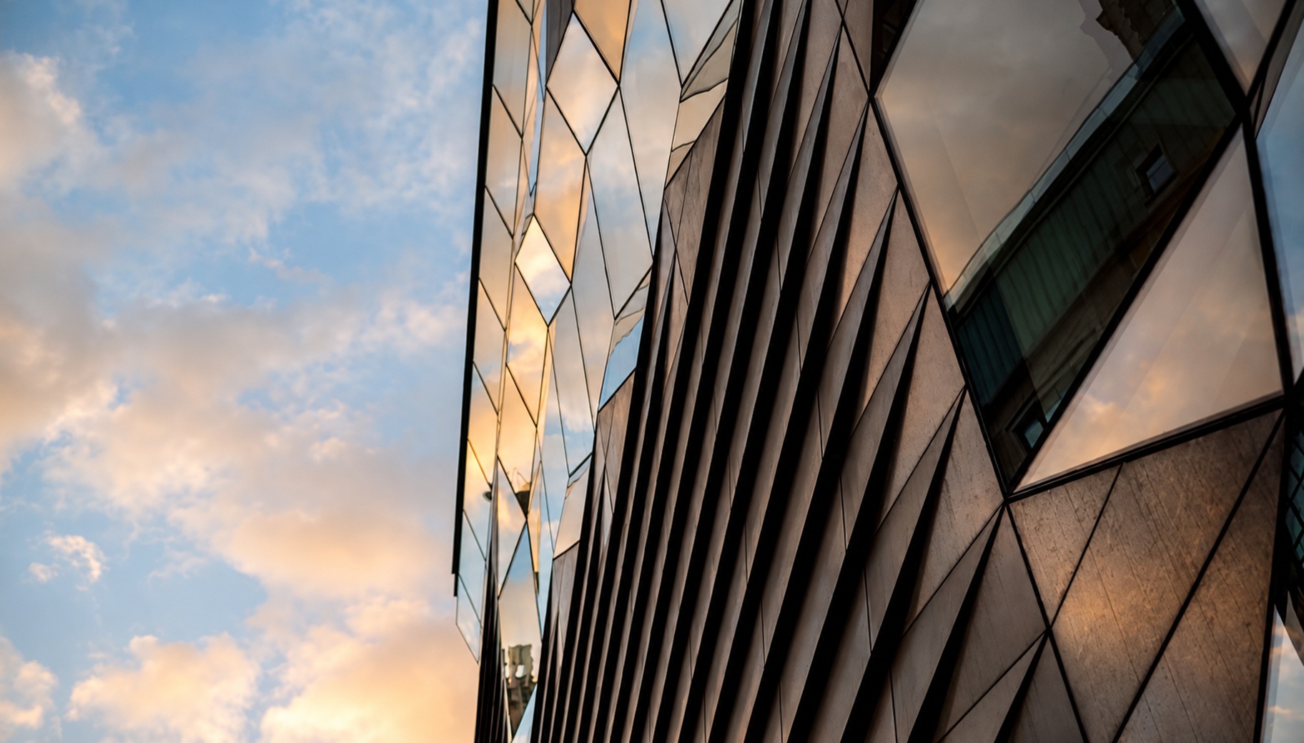 Geometric glass and metal facade of a contemporary building